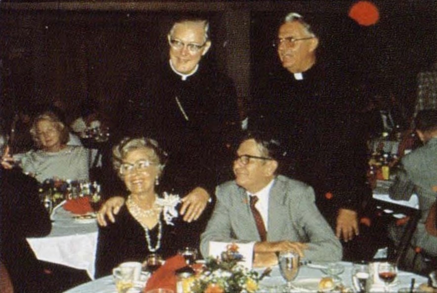 Archbishop Jurey, Jr., Dean Raba and Mrs. Raba at event